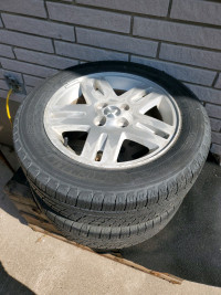 2 Chevrolet 16 inch 4 bolt rims and 2 new michelin tires chk pic