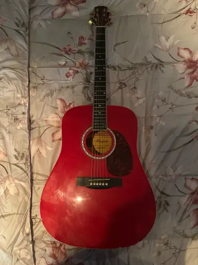 Red Guitar stored for a long time. The strings have been changed out so brand new. Contact for more...