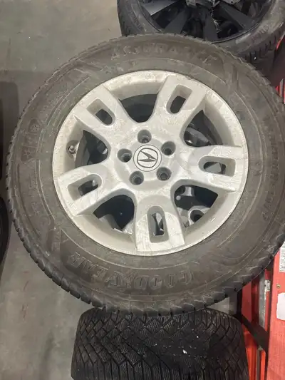 Near new, about 200km total on these Good Year Assurance Weather Ready 2 tires. Size is 235/65/17. W...