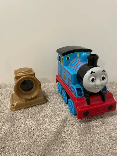 Thomas and Friends Follow Me Thomas Excellent condition Thomas follows the light as you shine the re...