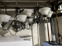 2 matching chandeliers with black metal and white glass