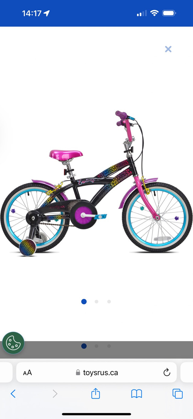 Vélo 18’’ avec petites roues et casque dans Enfants  à Laval/Rive Nord