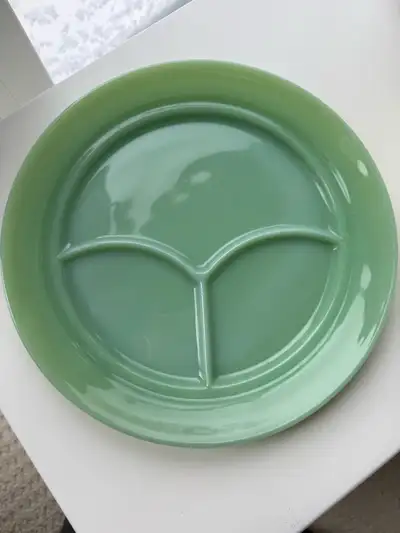 Very collectable vintage, heavy quality glass divided plate is super shiny and in great condition. R...
