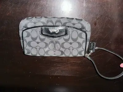 Coach black clutch/wristlet , View more