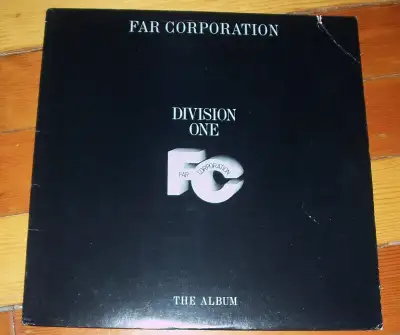 Here is the 1985 vinyl record LP album by FAR CORPORATION entitled DIVISION ONE - THE ALBUM. Contain...