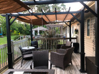 Pergola’s x 2 10x10 with new shade covers. Location is Cambridge