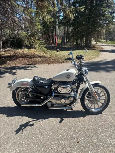2001 sporty 883. Runs good. Quick detach windshield Low kilometers Good rubber Slip on pipes Burly r...