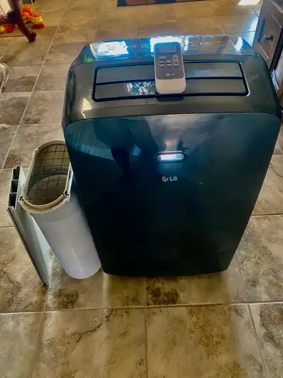  LG Portable air condition 12000 BTU with remote and window vent, View more