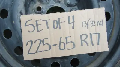 A set of 4 Goodyear Ultra Grip Winter tires. Two at 13/32nd and two at 11/32nd in depth mounted on D...