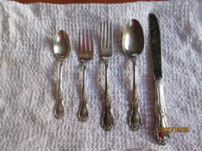 1847 Rogers Bros. silver plated 5-piece cutlery set. $4.00 for the set.