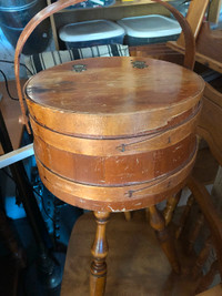 Antique round sewing basket with three legs and handle