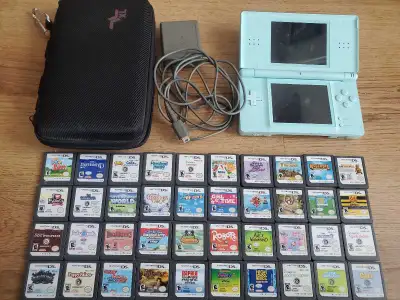 Nintendo DS Lite system ice blue, charger, case, 4 games, View more
