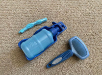 Doble sided dog brush and portable water bottle