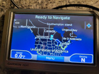 Older Garmin nuvi GPS with Otter box case