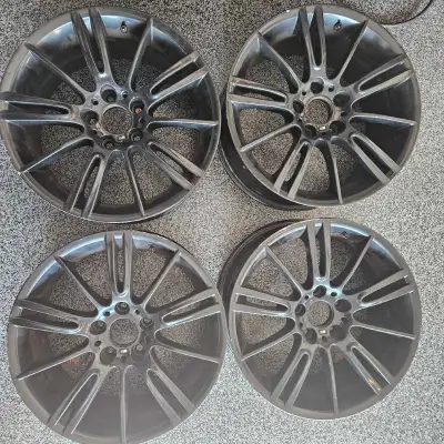 Set of 4 OEM BMW Style 193M rims Used. Very good condition. Black finish. 18 inch staggered widths f...