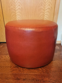 Red Round Leather-like Ottoman $100