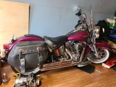 Exc cond 2016 heritage softail in rare custom color purple fire/ blackberry smoke. Only 23k babied k...