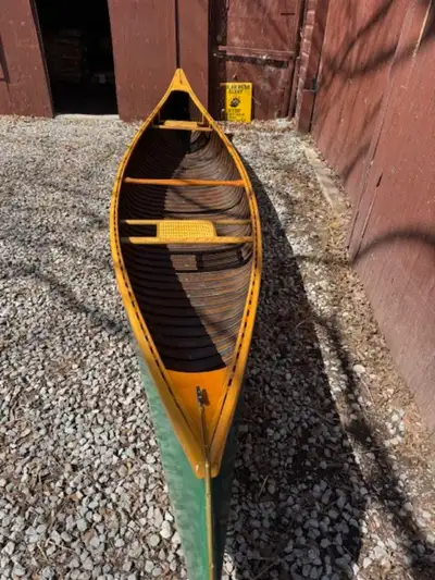 16 ft cedar strip canoe, excellent shape, approx 70-75 years old, stored inside on a proper canoe ra...