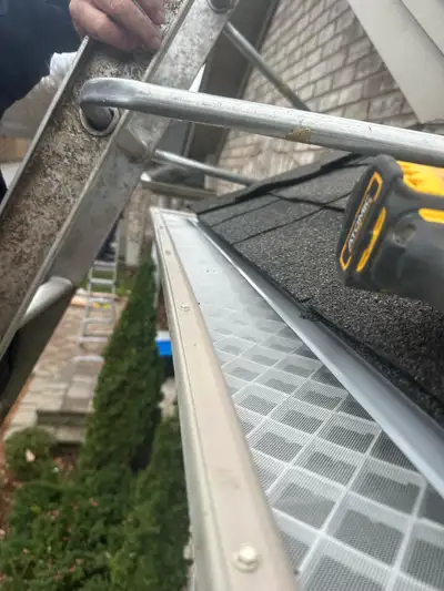 eavestrough cleaning and repairs gutter guards & tree cutting, View more