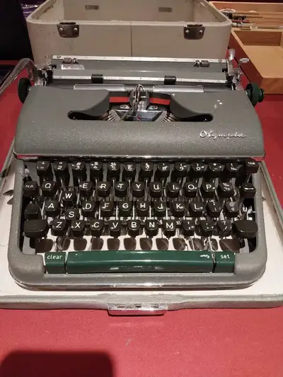Vintage Olympia sm4 typewriter, View more
