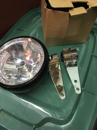 Motorcycle headlight and brackets