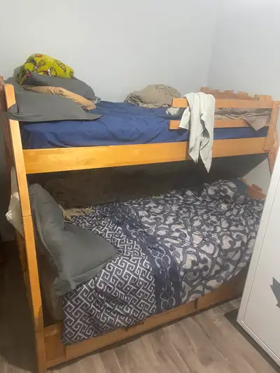 Looking to sell a solid wood bunk bed double on bottom twin on top it is 35 years old but still look...