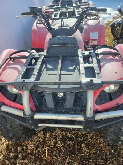 $4,000 PER QUAD. Fanatstic machines, all plastics intact. As photos show, seats could use reupholste...