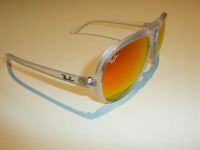 Ray Ban Clear Framed Cats 5000 Sunglasses with Orange Lenses, View more