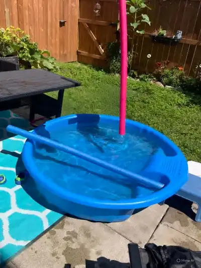 Large kiddie pool with slide. It is 1 foot deep with 4.5 diameter round . It has a plug for drainage...