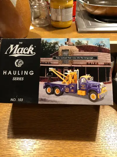 1998 first gear Mack tow truck. B61–new in box— asking 80.00. obo. Have other first gear and Corgi t...