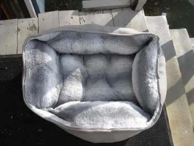 In a smoke-free and pet-free home. First is a Live Love Bark, 2-tone grey centered with solid-grey s...