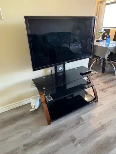 Samsung 46inch LED HD tv including Roku express with Glass table, View more
