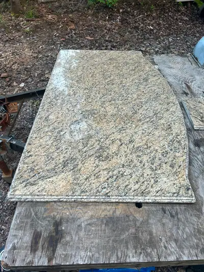 Beautiful large granite island top measures 6 feet 3 inches by 3 feet 7 wide plus a bar top matching...