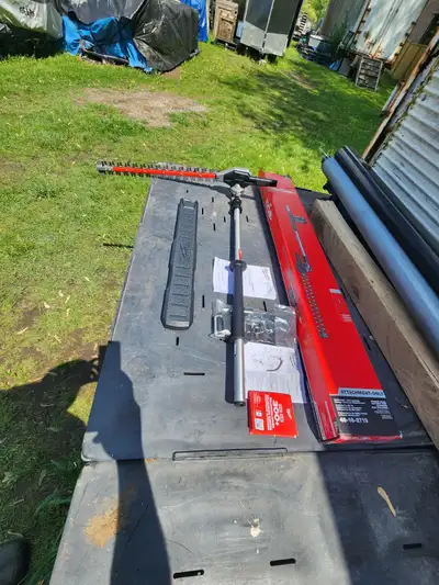 For sale a brand new, still in the box, a Milwaukee Tool M18 FUEL Hedge Trimmer Attachment For Milwa...