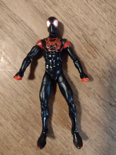 This is a Marvel Legends Miles Morales Spiderman figure from 2016's into the spiderverse. He is in g...