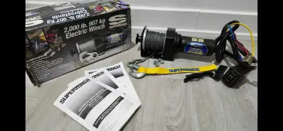 BRAND NEW IN THE BOX 2000 lbs electric winch ready to be installed Asking $200