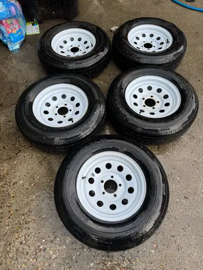 5 205/75R14 Tires and rims. Great condition tread is 95% on four and the fifth is brand new. They ar...