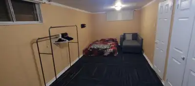 A spacious room for rent with access to a shared bathroom and kitchen The room in semi furnished wit...