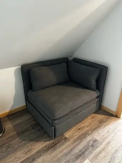 IKEA corner chair that rolls out to make a small bed , View more