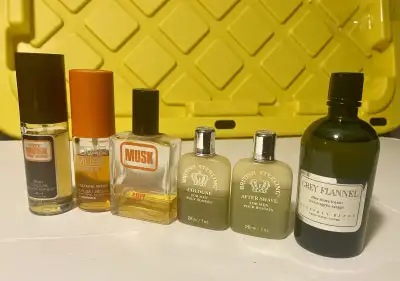 This is a collection of vintage men's colognes, perfect for collectors or anyone looking to explore...