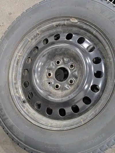 I am selling a pair of Michelin X-Ice Snow SUV winter tires, size 225/65R17 106T, mounted on steel r...