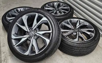 Set of Honda Civic Original rims with Bridgestone turanza good condition the rims has some minor cur...
