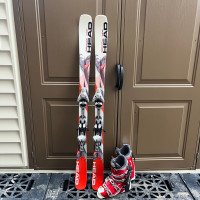 145 Head ski  twin tips  with boots 