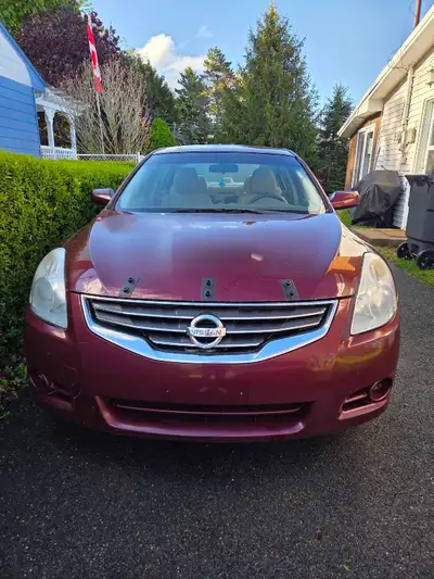 2011 Nissan Altima for full part out or Repair. Still running and drives, o2 sensor out, catalytic c...