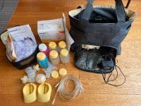 Medela Pump In Style Advanced double breast pump w/carry tote