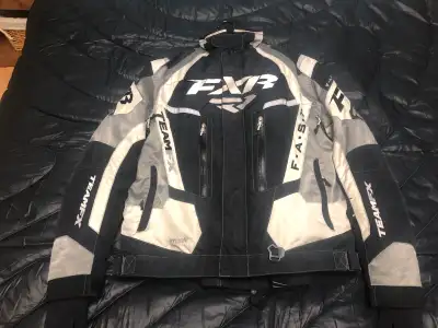 Used FXR snowmobile suit FAST size large for jacket and pants No rips There’s one rear vent zipper t...
