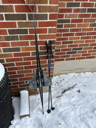 Waxless skis 160cm Size 2 boots Poles included