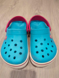 Turquoise and pink size J1 Crocs 