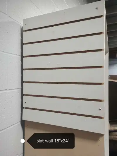 slat wall panel with some hooks, View more