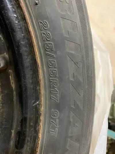 Blizzak DM-V2 Run 1 season tread depth 5/16”. On rims from a Subaru. 5-100 bolt 56.1 hub. $400 obo.